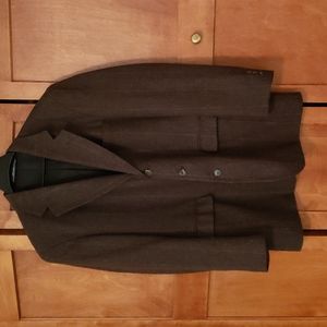 Mens Sport Coat in a size 42L.  Made by Haggar Clothing Co. Mostly brown color.